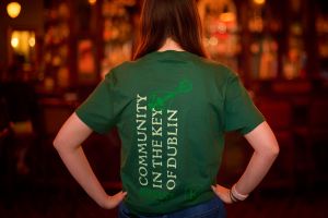 View of back wording on green pub swag t-shirt for Kieran's Irish Pub
