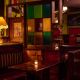 View of the booth seating in the bar area of Kieran's Irish Pub